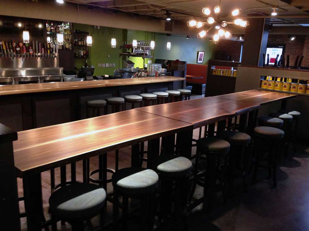Pizza Luce – Community Table, Wood Block Cladding, Business Promotional Flight Paddles
