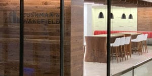 Black Walnut Paneling | Live-Edge Tables | Ceiling Baffles | Live-Edge Shelves | Wood From The Hood | Cushman Wakefield | Minneapolis