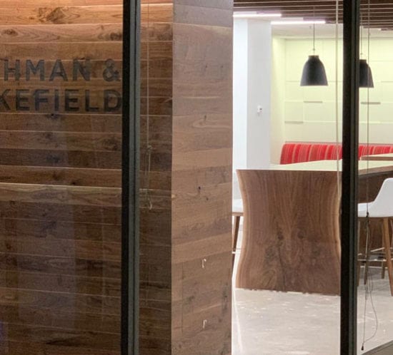 Black Walnut Paneling | Live-Edge Tables | Ceiling Baffles | Live-Edge Shelves | Wood From The Hood | Cushman Wakefield | Minneapolis